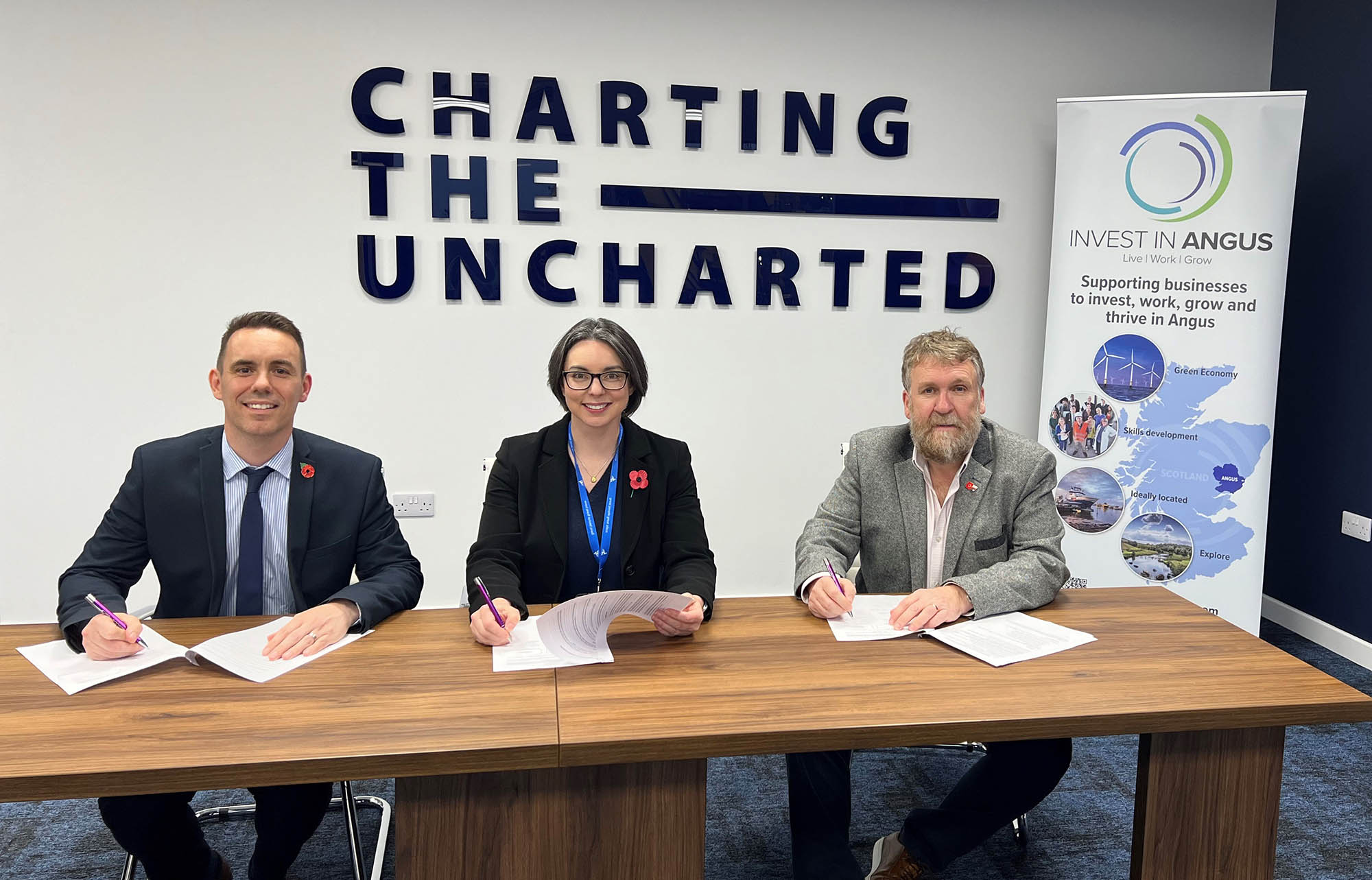 Simon Hewitt, Kathryn Lindsay and Tom Hutchison signing the MoU)