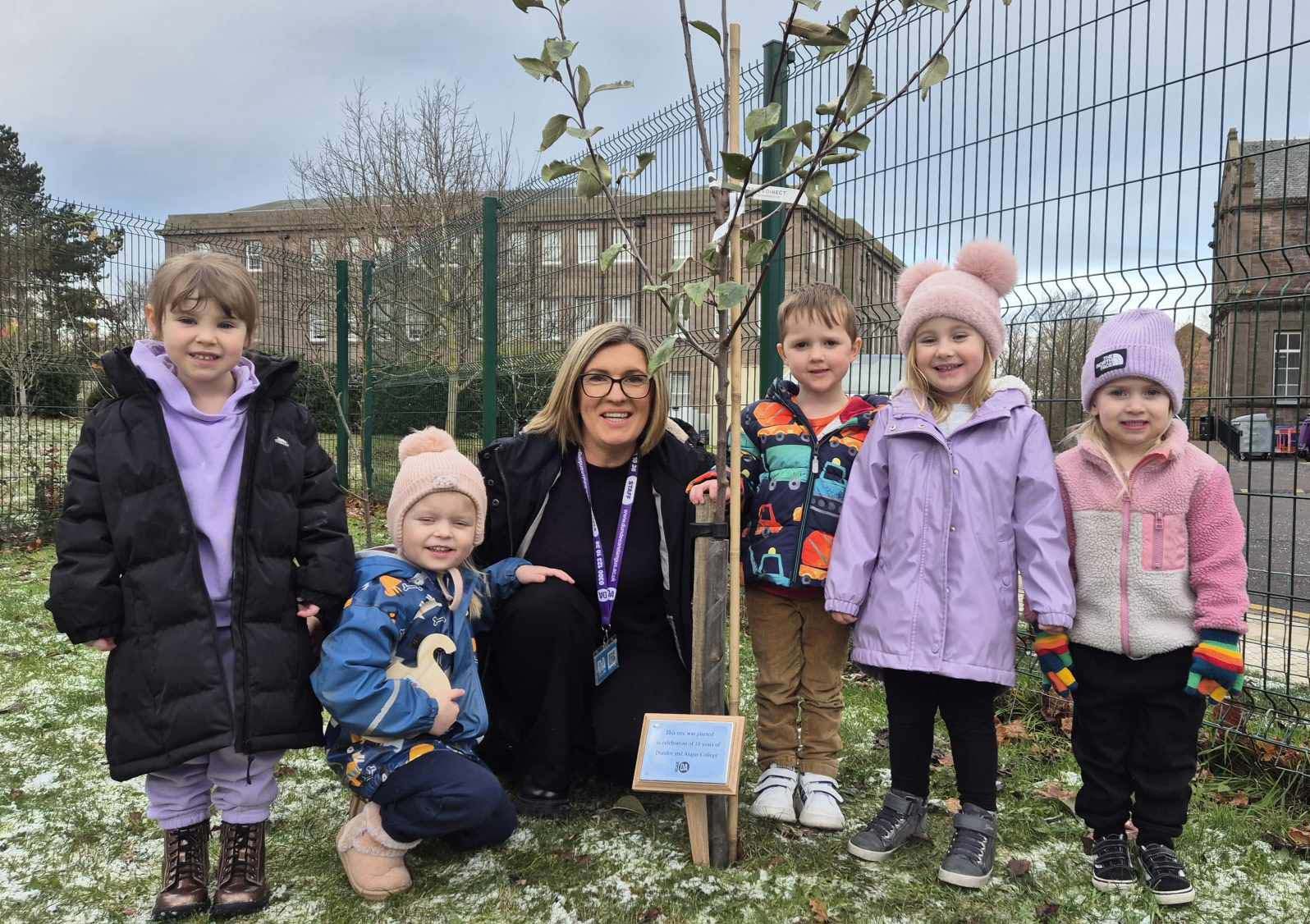nursery children with a tree