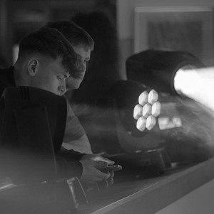 students with spotlights