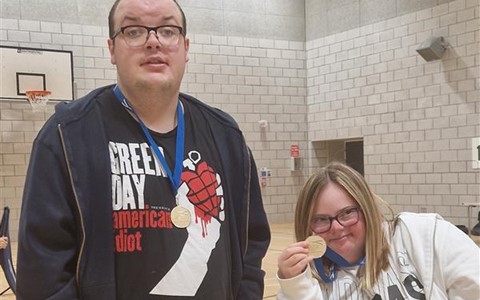 Jenna and Cameron with their Gold Medals