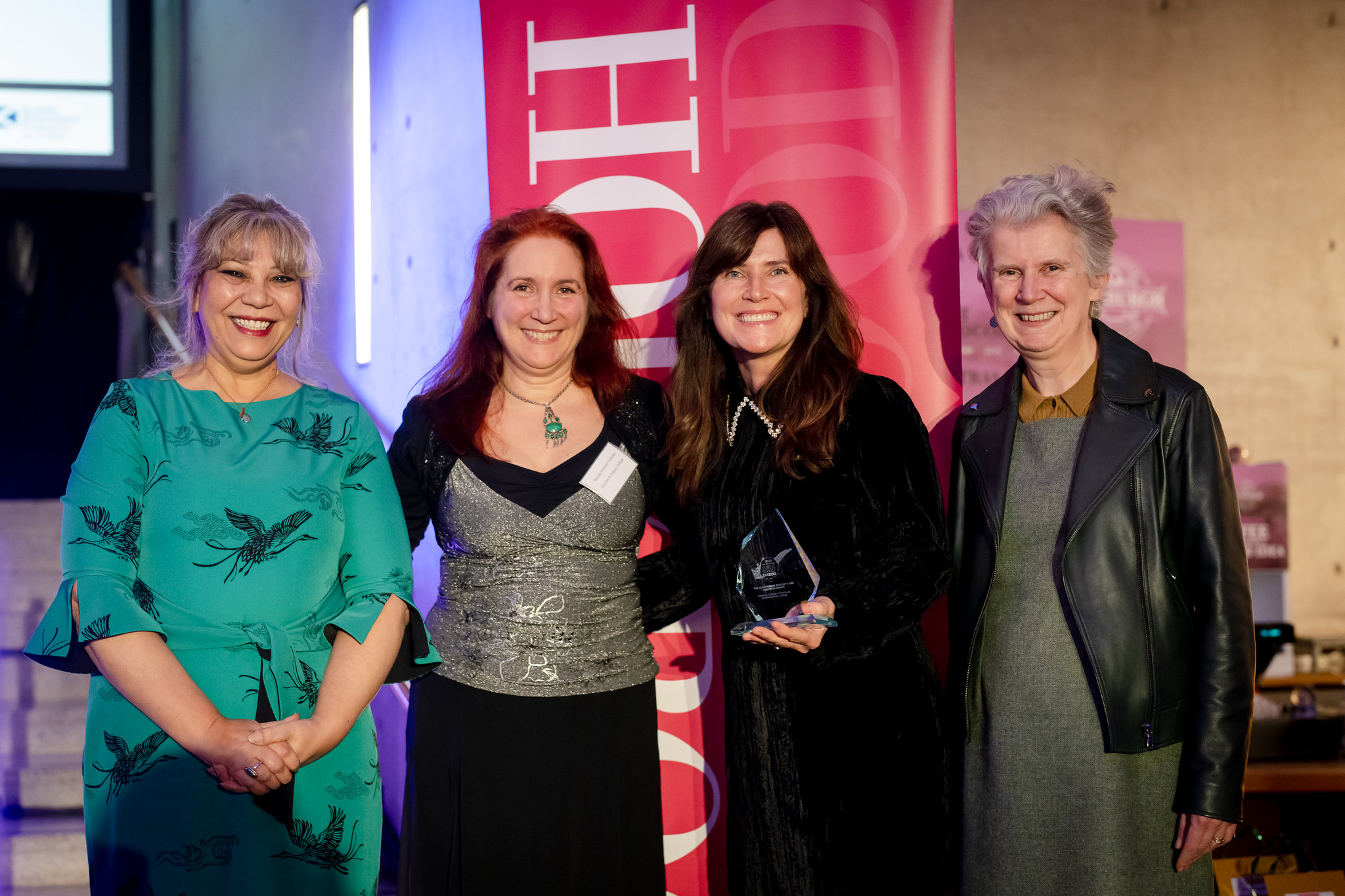 Nicola Weston Goklap and Katie Baxter, centre collecting the Championing Diversity and Inclusion Award at this year's Scottish Public Services Award)