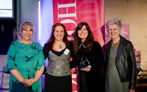 Nicola Weston Goklap and Katie Baxter, centre collecting the Championing Diversity and Inclusion Award at this year's Scottish Public Services Award