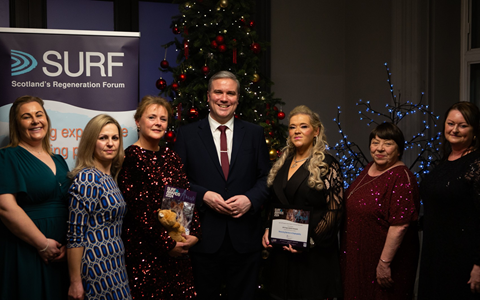 Left to right - Leanne Macdonald, Neslihan Osmanali Employment Support Worker, Lorna Strachan Occupational Therapy Team Lead , Tom Arthur MSP Minister for Employment and Investment, Danielle Najahi Employability Co-ordinator, Judith Golden Development Lead (Employability & Apprenticeships) and Louise Henderson. Collecting their SURF Award.