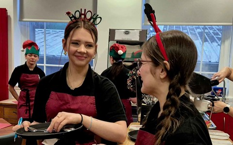 Senior Phase Hospitality students serving smiles and hot drinks at the Festive Fayre at our Arbroath campus