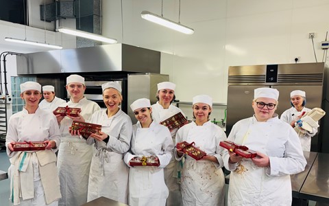 Students showcasing their chocolate work during Industry Week