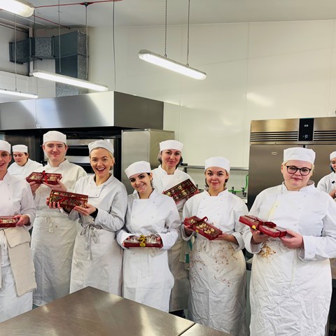 Students showcasing their chocolate work during Industry Week