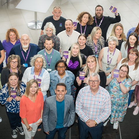 Principal and VPs of D&A College stand with a group of award winning staff at the colleges 2025 Staff Award Ceremony