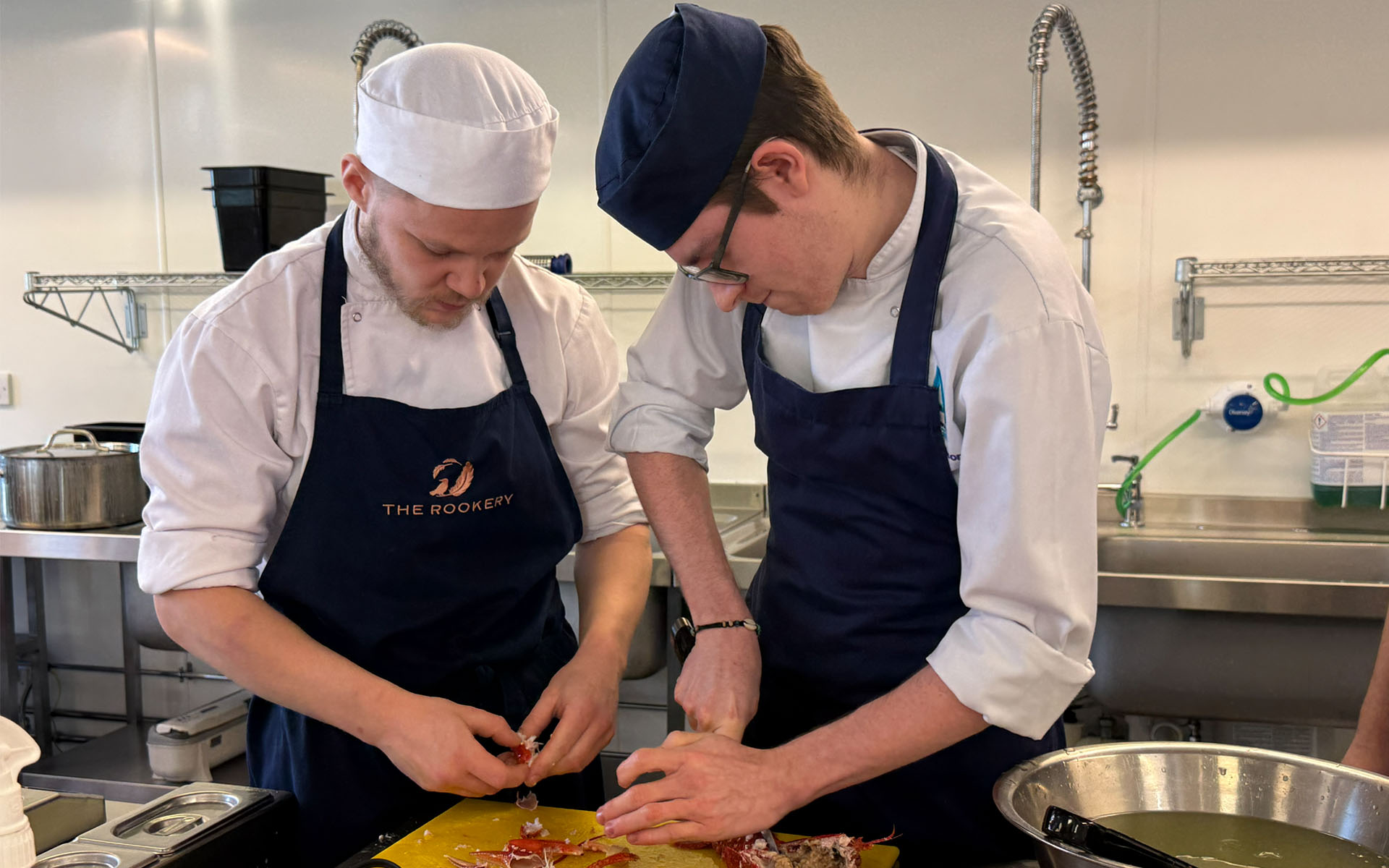Students chopping lobster