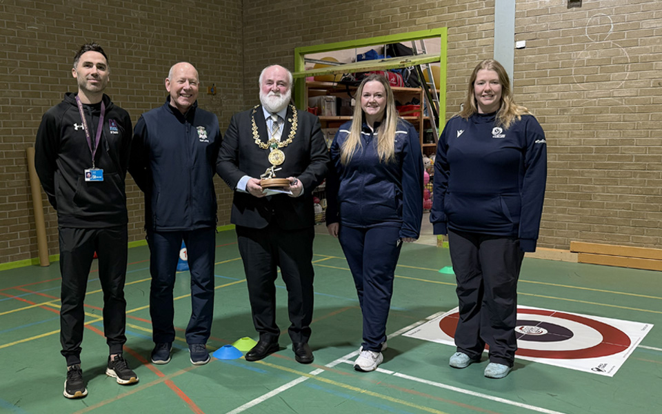 Partners and Lord Provost group photo at curling event