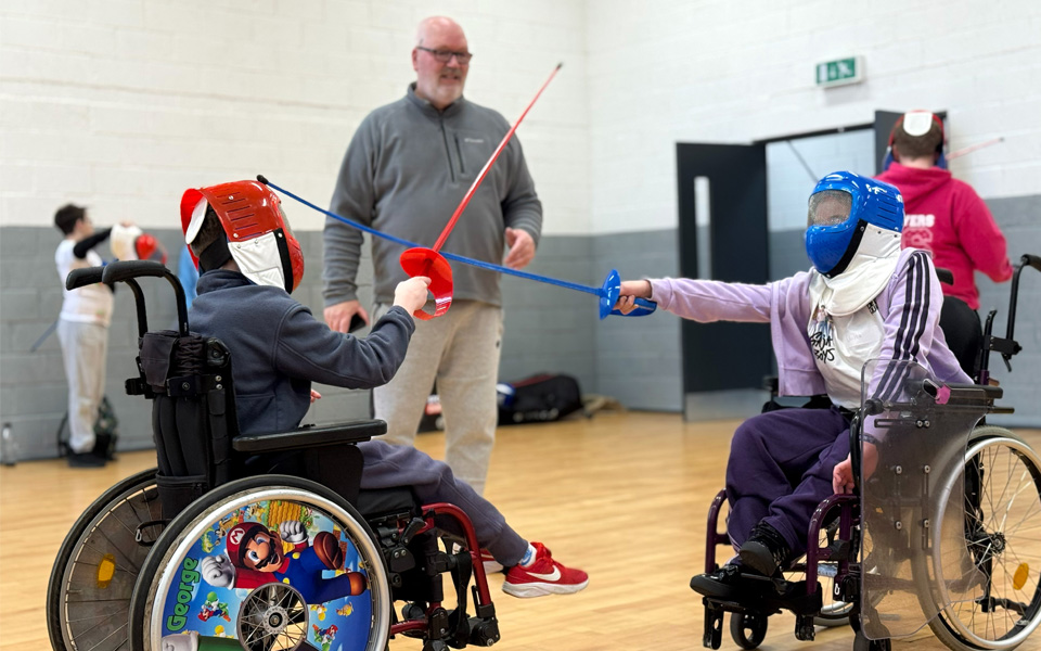 School pupils fencing whilst in wheelchairs)