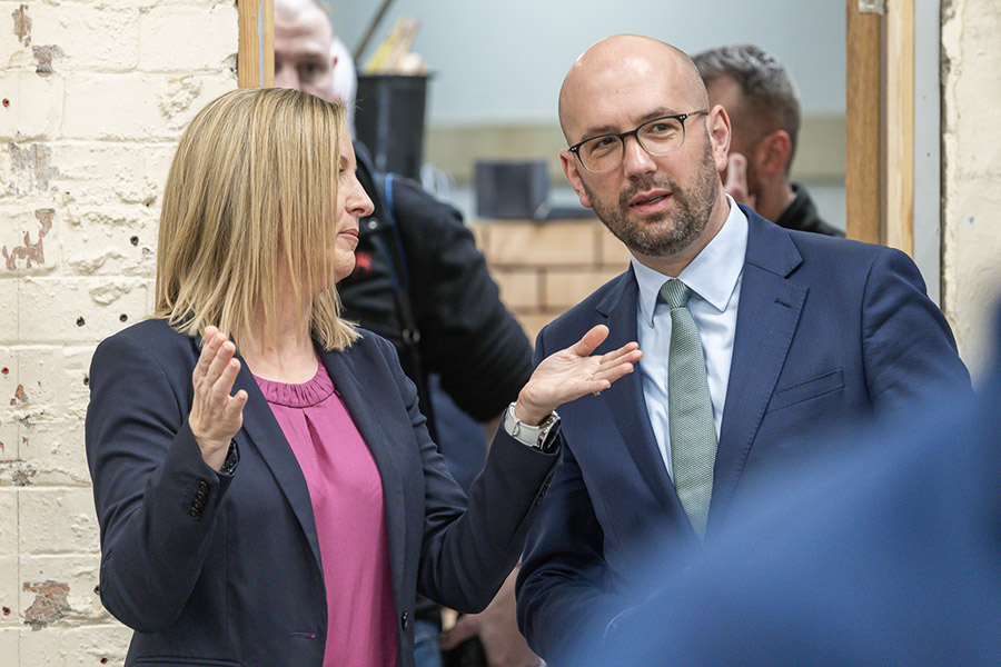 College staff & Ben Macpherson in workshop