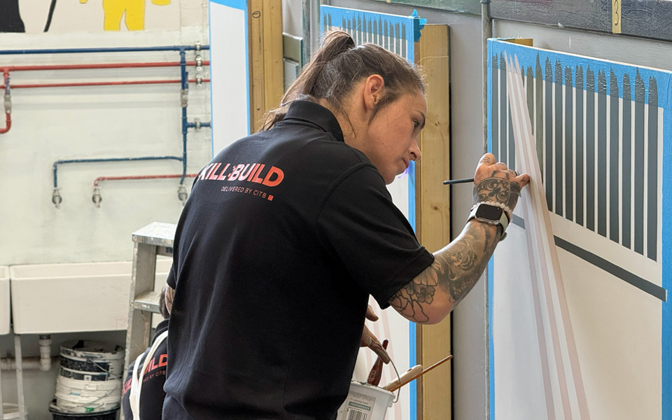 Painting and Decorating student painting mural