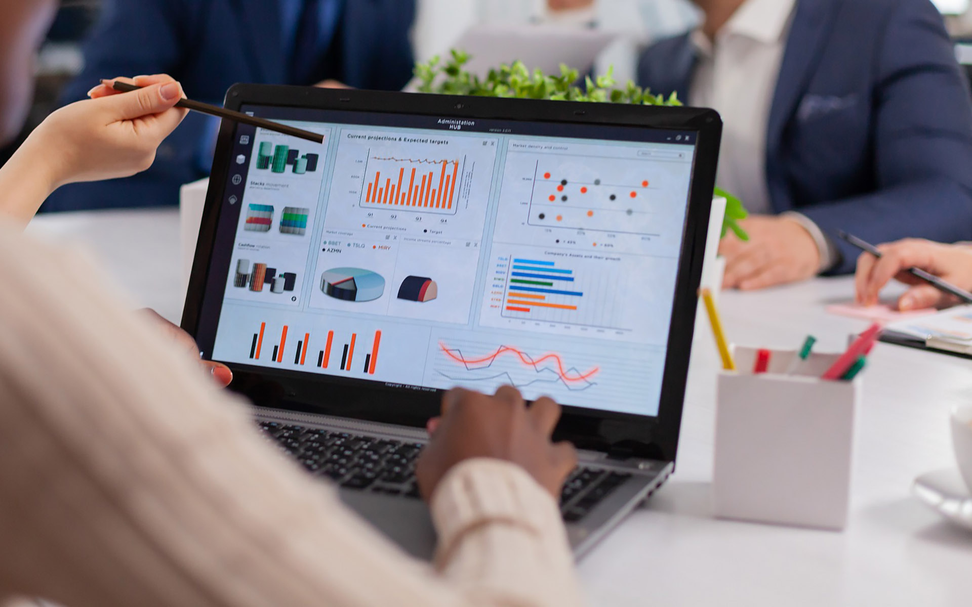 Laptop screen with charts on it