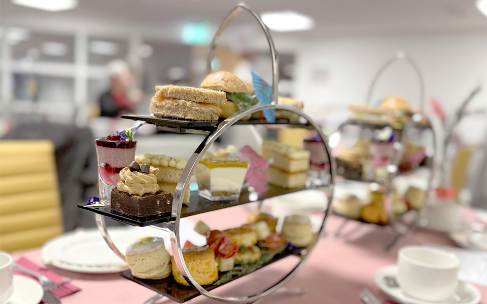 Afternoon tea on stand on table at event