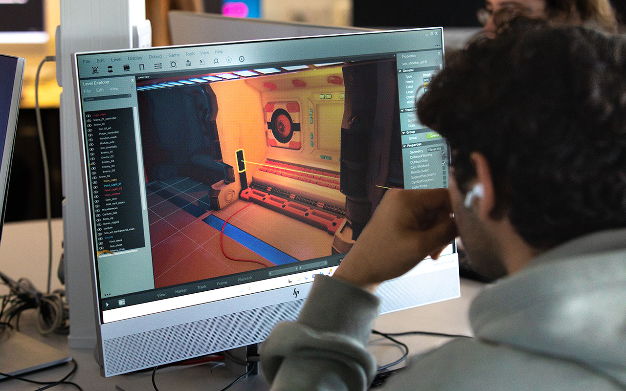 Student designs an animated scene on a desktop computer screen