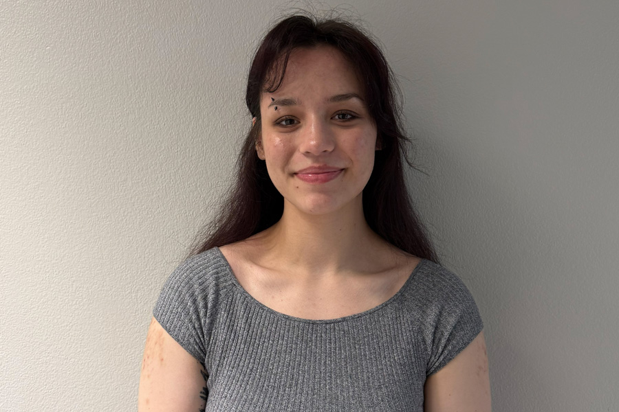 Student smiling at camera